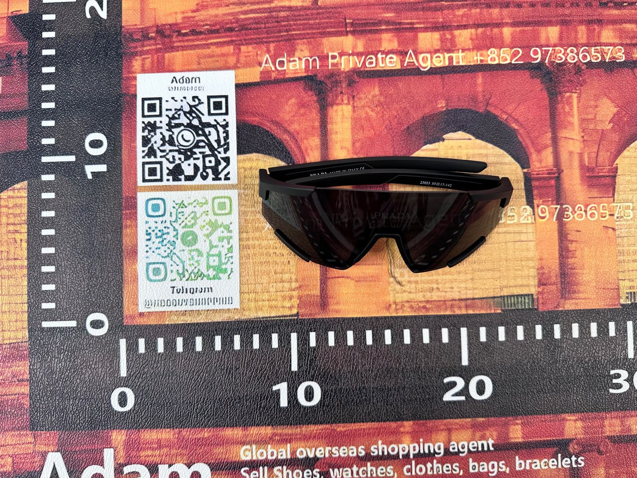 PRADA SUNGLASSES