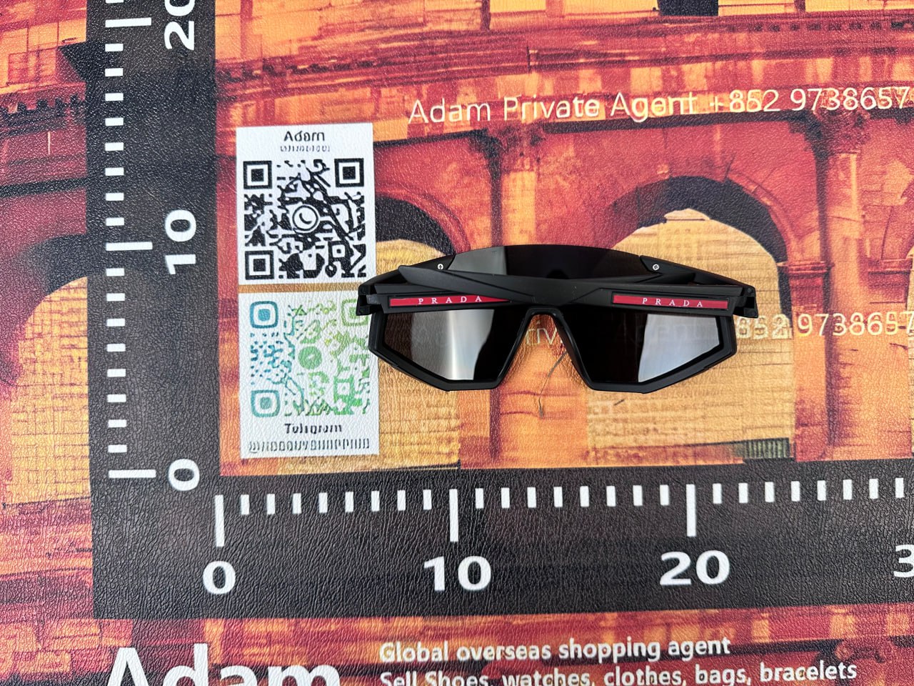 PRADA SUNGLASSES